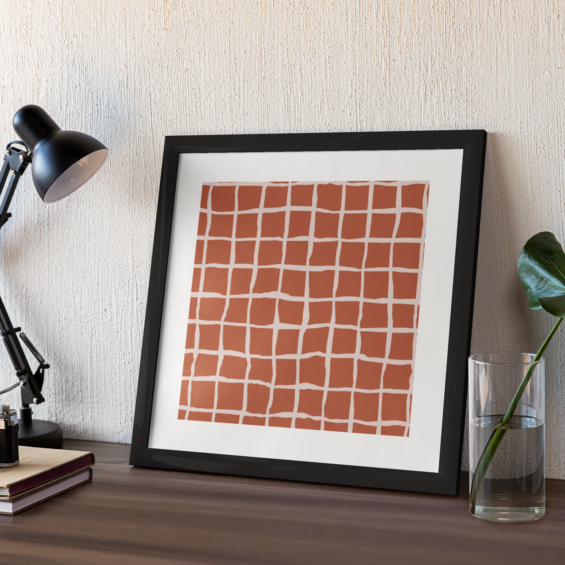 Introducing our stunning square boho-inspired art print, designed to make a statement in any space. Featuring a relaxed grid pattern on a warm and inviting terracotta background, this piece adds bohemian charm to your home decor.