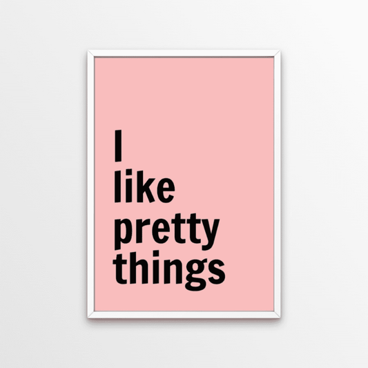 An art print with attitude.  A bold typography poster, with black font on a light pink background.  Fill your home with all the pretty little things that you love - and this statement print.