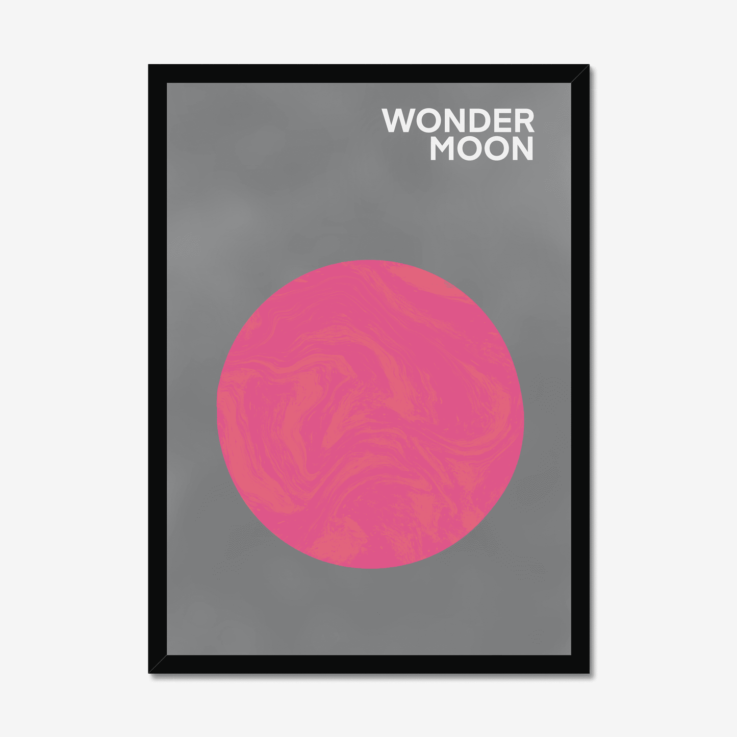 We're obsessed with this unique luna print.  A marble effect moon on a grey sky background.  We've got this one in a natural frame in our print office and we love it!