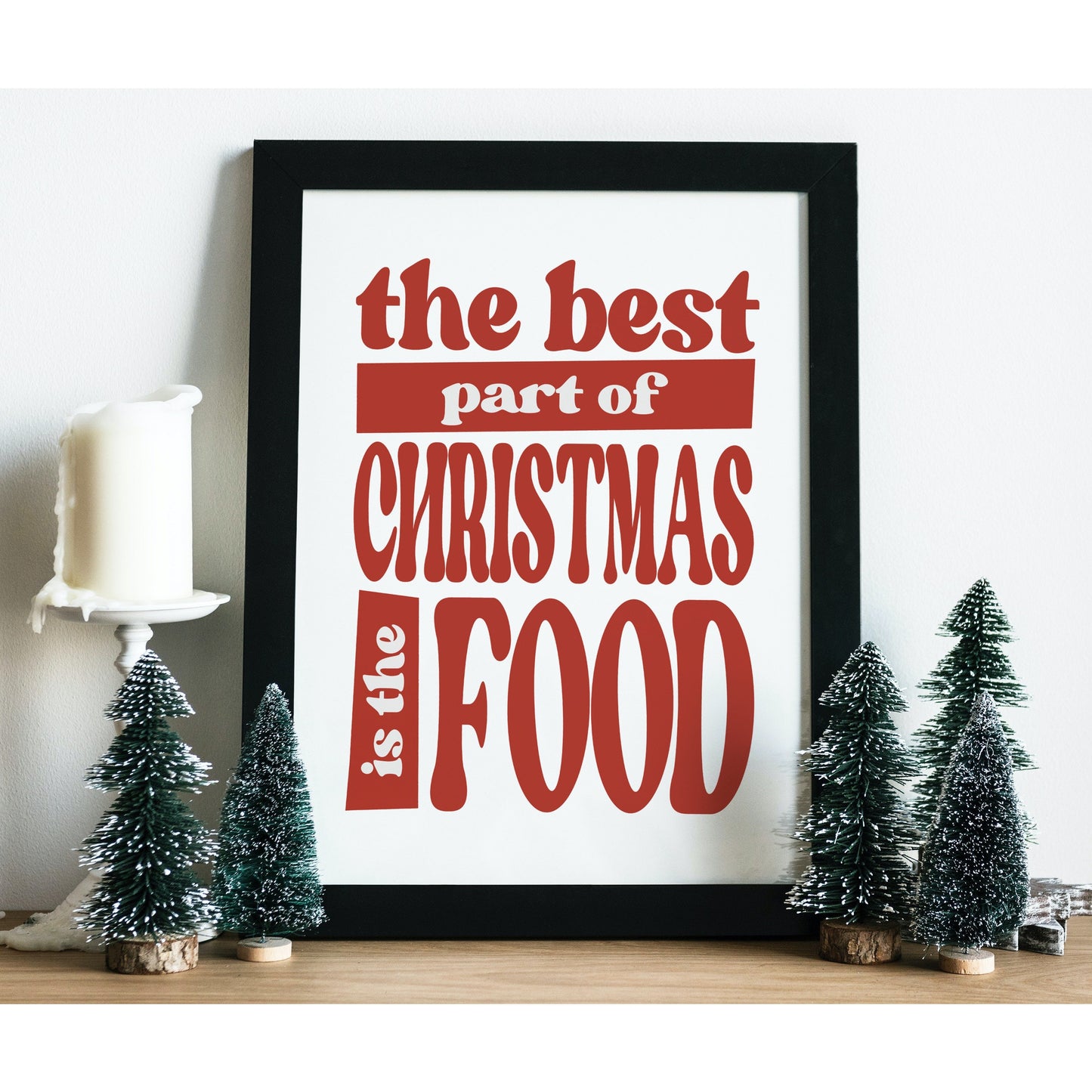 What's the best thing about Christmas? The food, of course! This fun and quirky art print poster features the quote "The best thing about Christmas is the food" in red font. It's perfect for anyone who loves to enjoy all the delicious holiday treats!